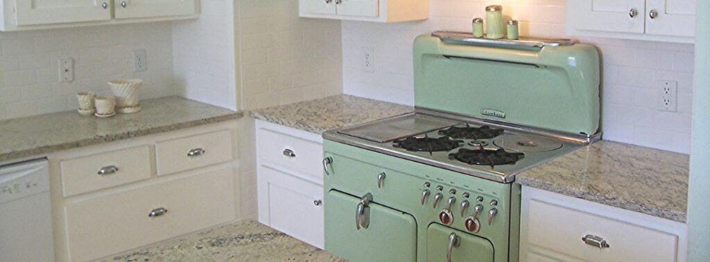 Vintage kitchen with retro stove and granite counters
