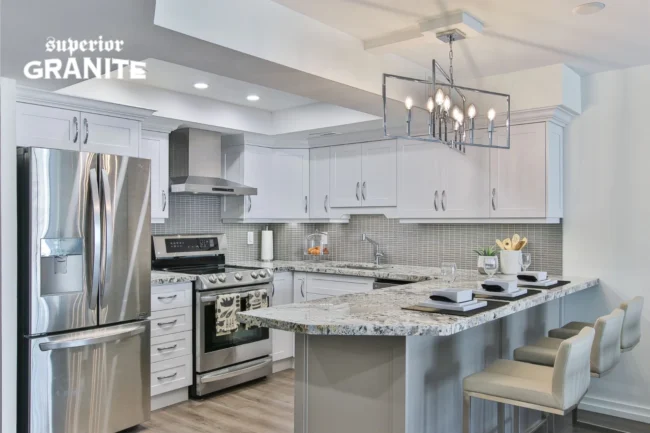 A pricing chart shows the Granite Countertops Cost in Florida Cities, with prices ranging from $50 to $150 per square foot in 2026. A pricing chart shows the Granite Countertops Cost in Florida Cities, with prices ranging from $50 to $150 per square foot in 2026.