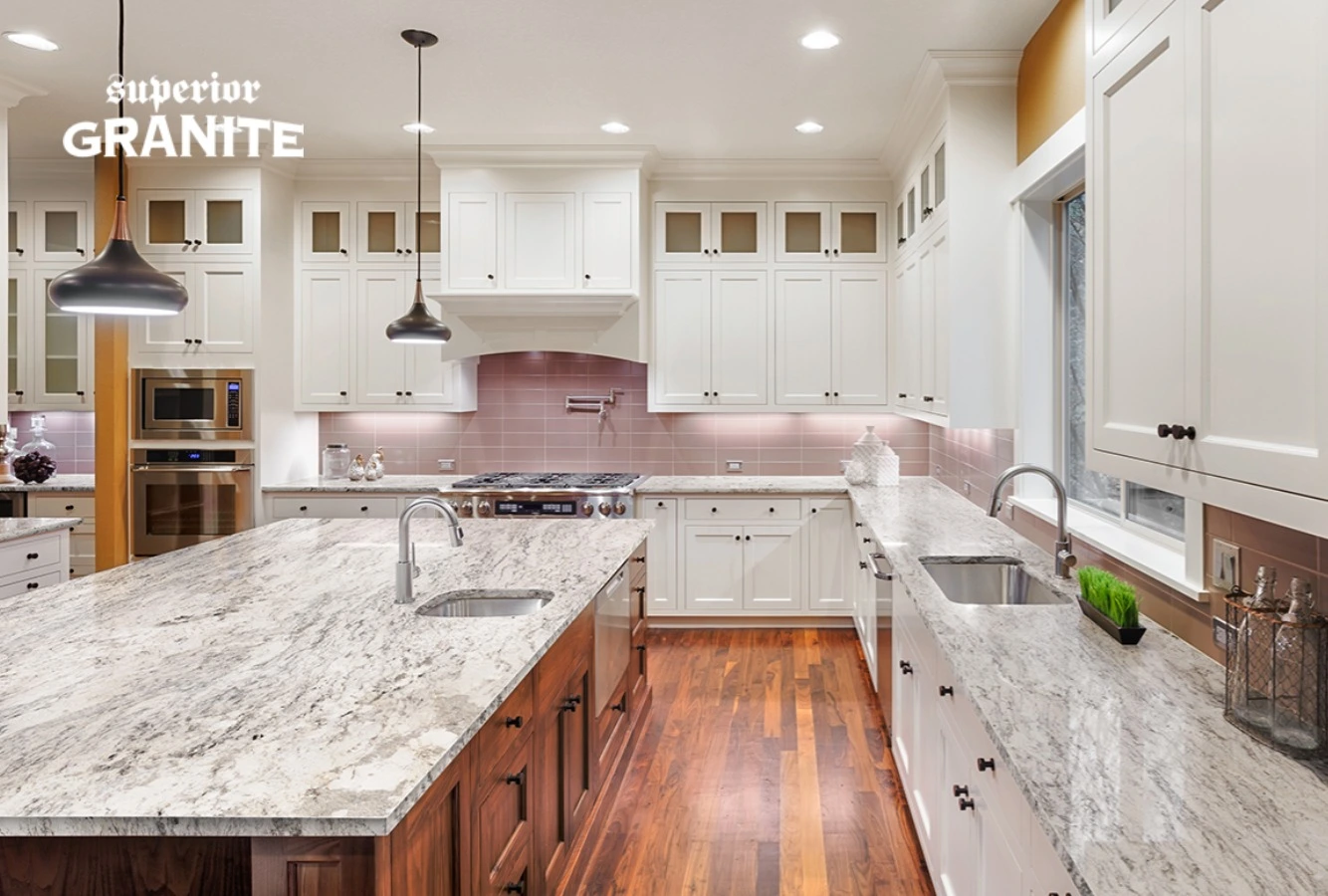Modern kitchen featuring elegant white cabinetry and premium natural stone countertops for Pensacola homes.