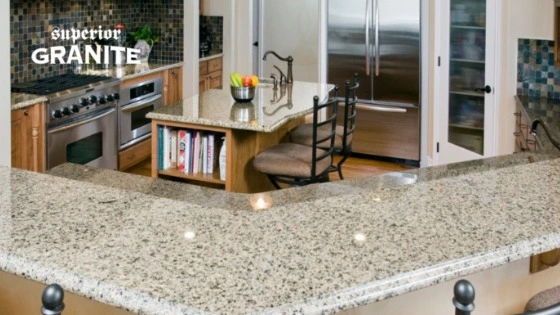 Kitchen with polished granite island and backsplash, showing how to Seal Granite Countertops well