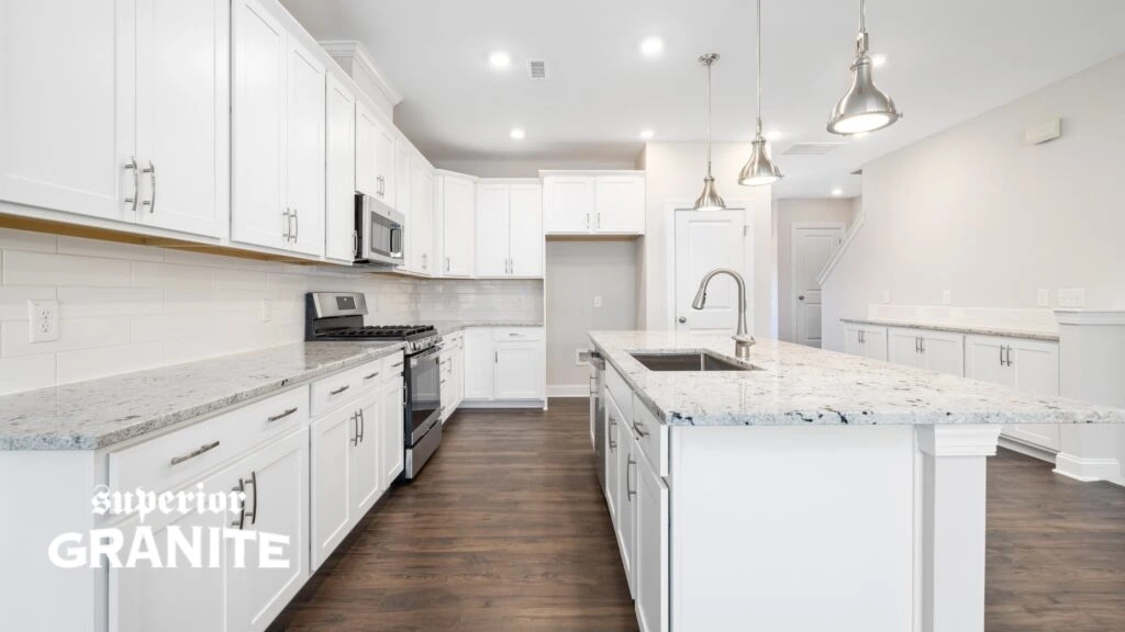 Bright modern white kitchen with island and Quartzite countertops cost details in stylish home design setup