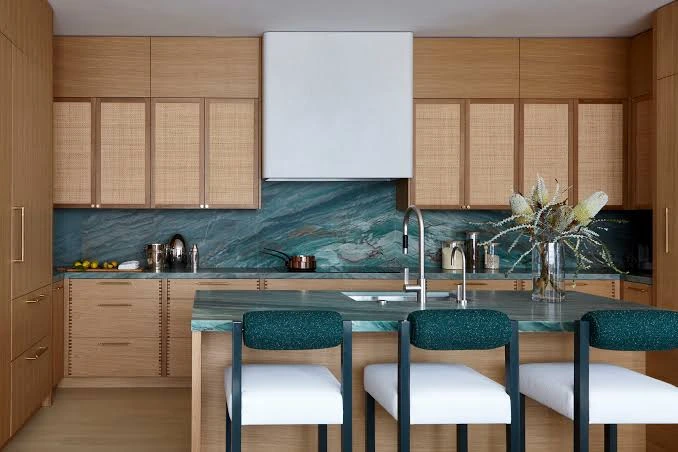 Modern wooden kitchen cabinetry paired with dark Trending Countertop Colors.