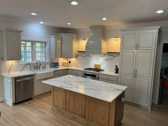 Modern kitchen showing quartz for ideal countertop stone selection.