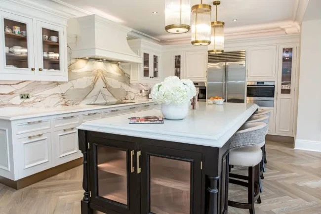Elegant kitchen featuring a unique design by mixing stone textures. Elegant kitchen featuring a unique design by mixing stone textures.