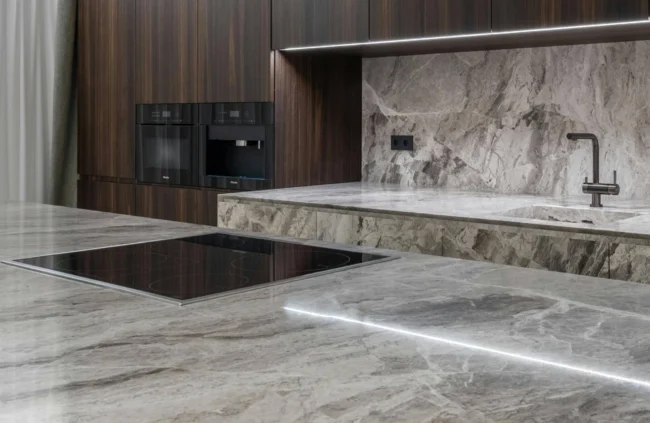 Modern grey veined marble slab design featured as a luxury Kitchen Countertop Material. Modern grey veined marble slab design featured as a luxury Kitchen Countertop Material.