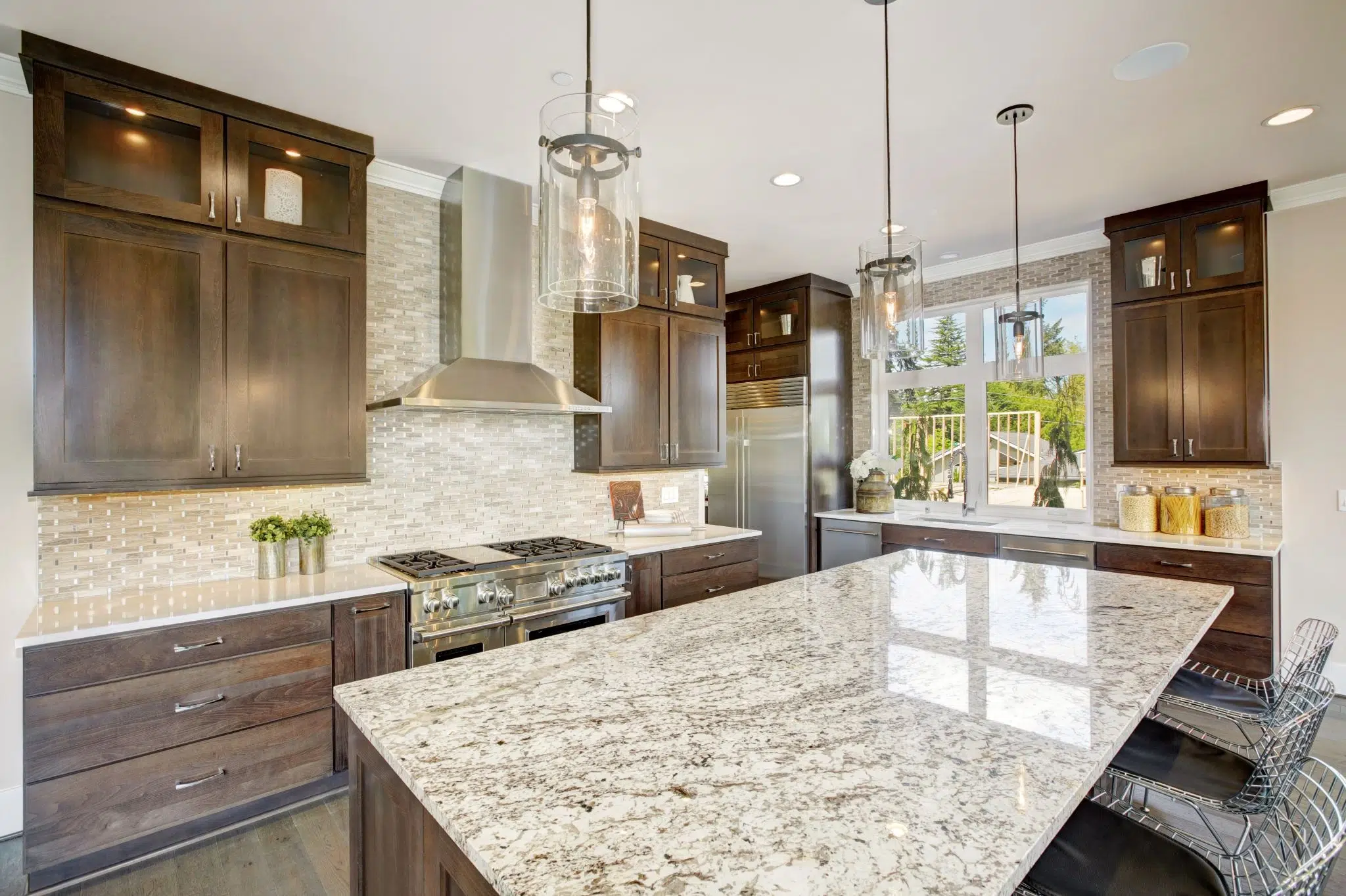 Granite island surface installed for modern family kitchen countertops remodeling.
