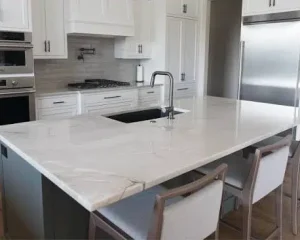 Elegant kitchen interior designed with Azzurra Bay Quartzite surfaces.