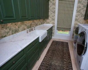 Modern kitchen featuring elegant Quartz Countertops that are smooth, durable, and easy to clean, offering a stylish alternative to granite or marble.