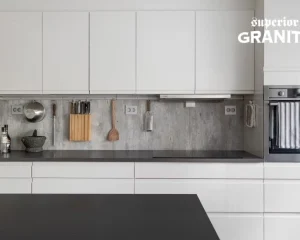 Elegant kitchen with Natural Stone countertops showing timeless beauty, strength, and durability by Superior Granite.