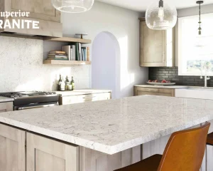 A modern kitchen with a large marble-style island, effectively helping homeowners budget for quartz countertops cost.