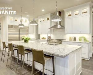 Modern kitchen with island showcasing Granite Countertop Services in Pensacola and custom stone design.