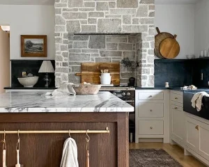 Beautiful rustic kitchen design featuring stylish two-toned countertops.