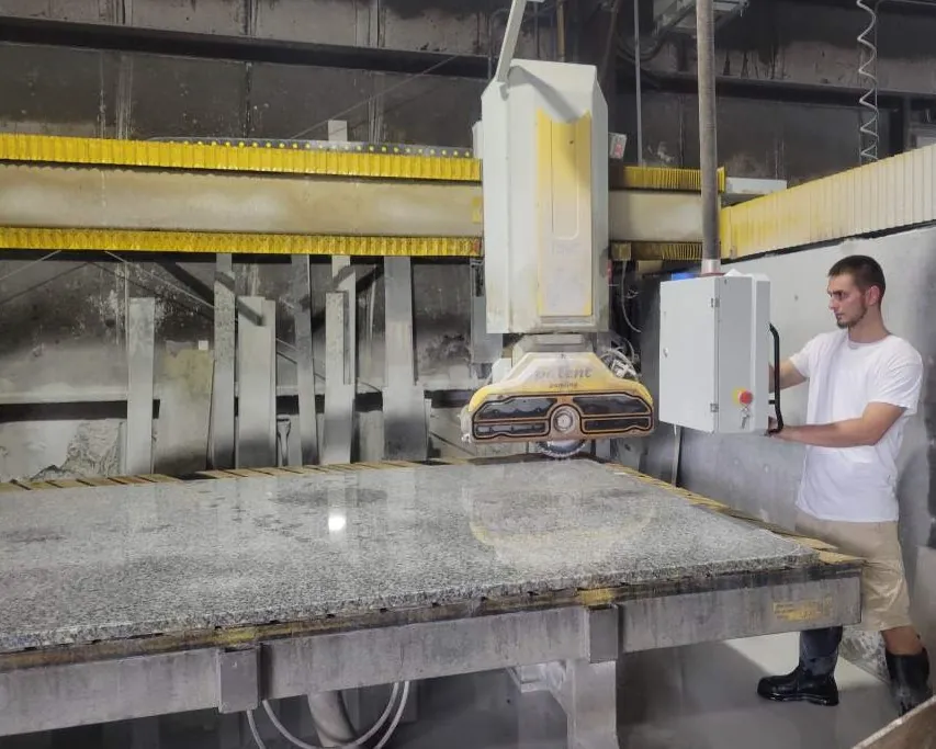 Machine cutting granite