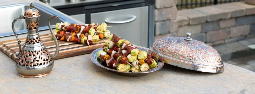 Shish Kabobs Being Prepared at an Outdoor Kitchen