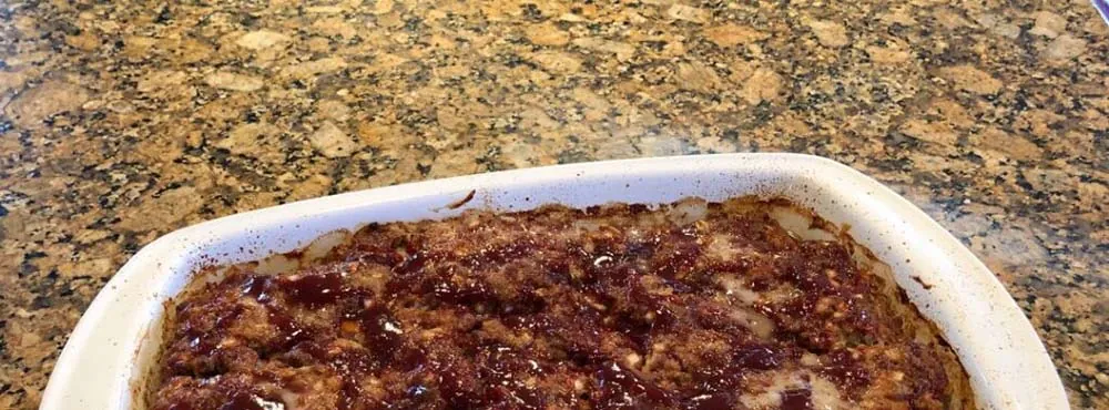 food in hot dish on granite countertop
