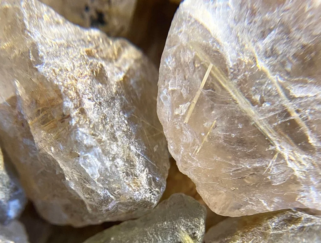 Raw quartz and granite crystals close-up for coastal Florida countertop comparison